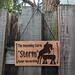 Personalized Name Plate with Cross Country Jumper image, Traditional Pecan wood stain, and font choice . Hung with a black suede cord